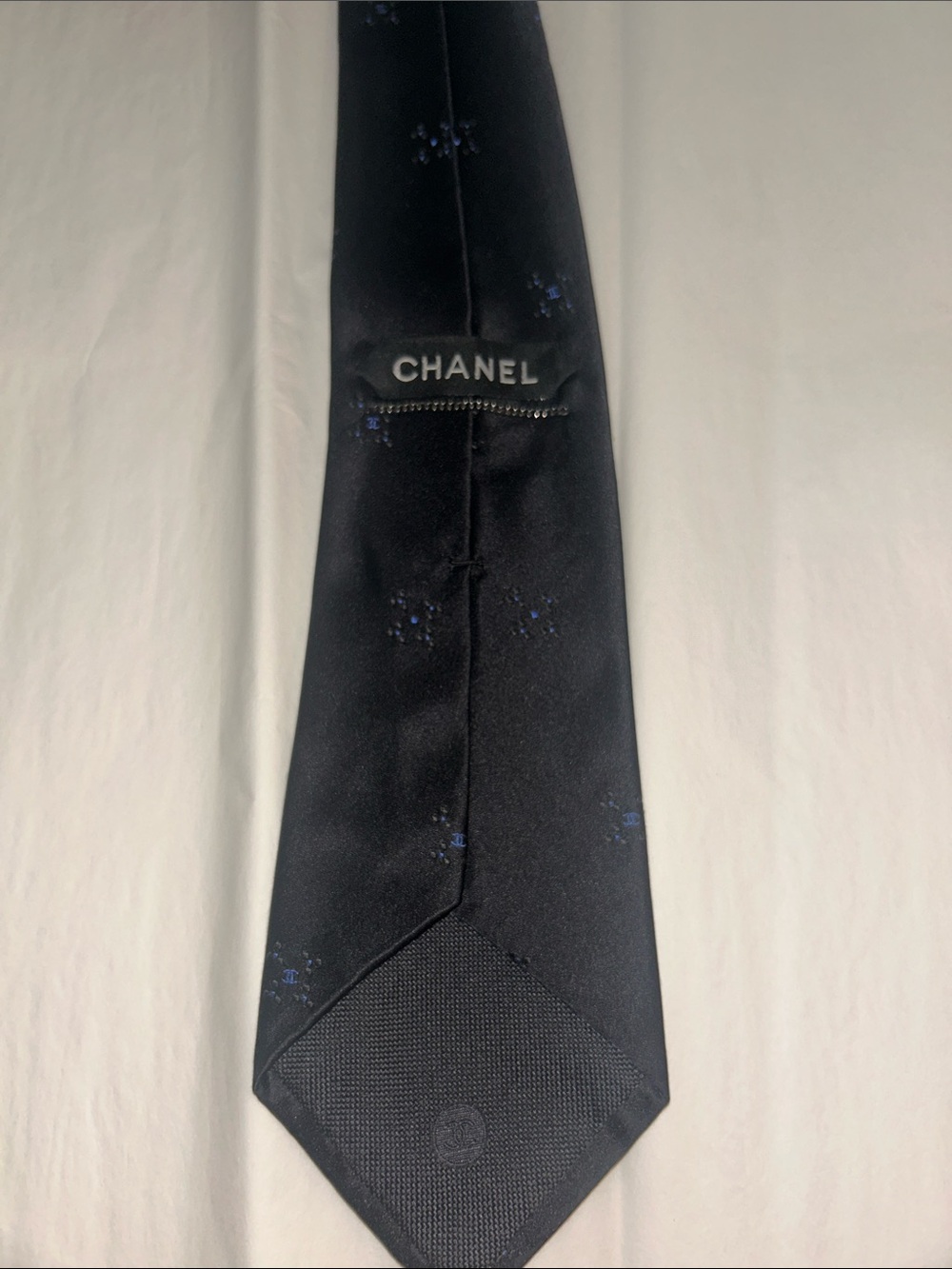 CHANEL Black Tie with Subtle Blue Motifs